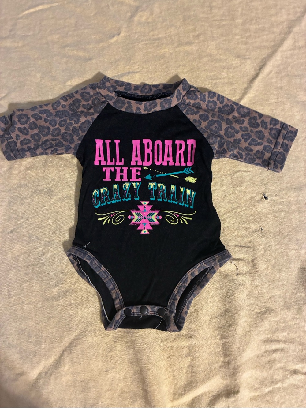 Girl’s 0-6 Months Crazy Train Leopard Onesie